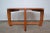 This large solid teak coffee table was designed by Niels Eilersen in the 1960s. The piece remains in a fully original...