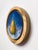 This oil painting on wood panel features a solitary pear, beautifully rendered against a deep blue background that evokes...