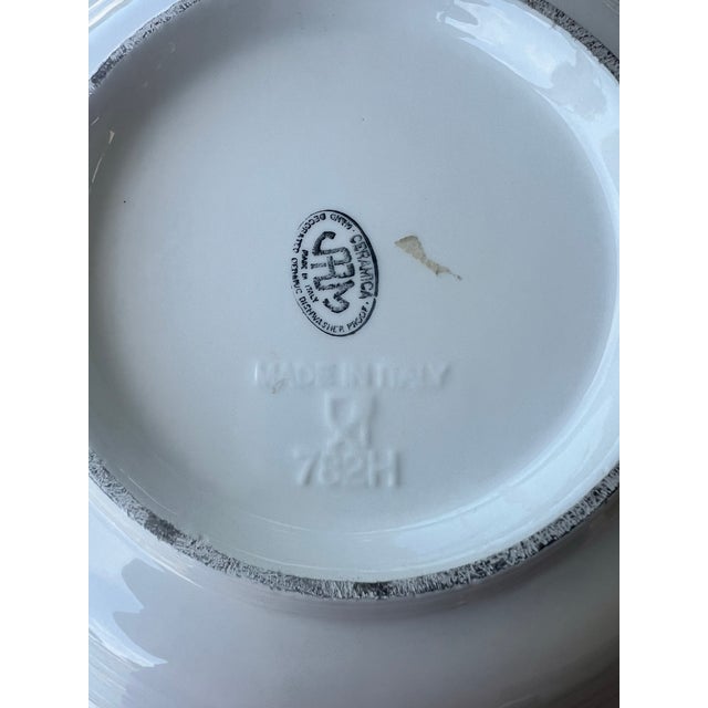 This beautiful decorative plate by Ceramica Jrm is a must-have for any collector or lover of Italian art pottery. The...