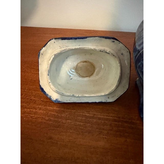 Late 1700s or early 1800s Staffordshire flow blue sugar bowl & lid, likely Enoch Wood designed, with interesting cupid...