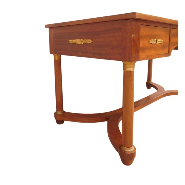 Antique Empire-style wooden desk with bronzes. The top still has its original fabric.