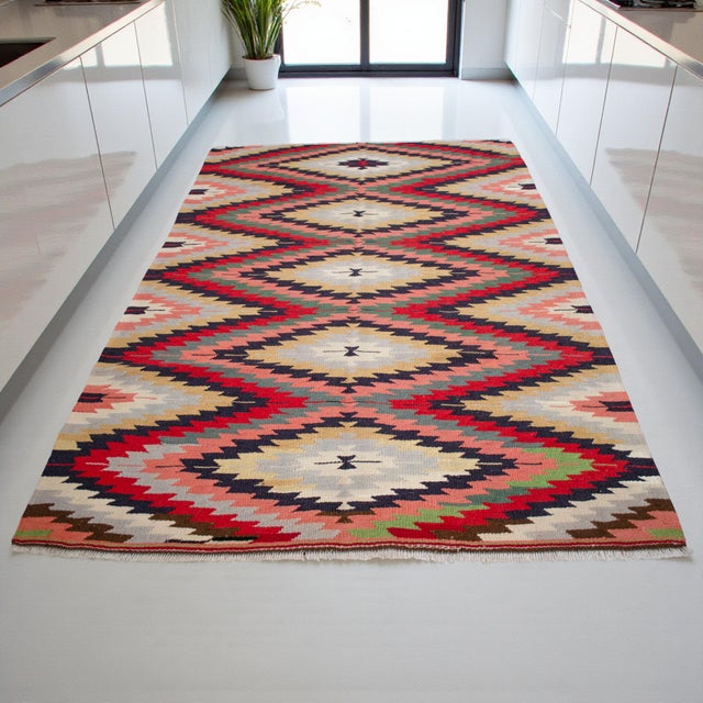 Handwoven in a Barak tribe village near Antalya on Turkey’s Mediterranean coast, this 1970s Turkish kilim brings a bold...