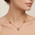 This exquisite necklace features a radiant pairing of golden-yellow Citrine gemstones, prized for their sun-kissed...