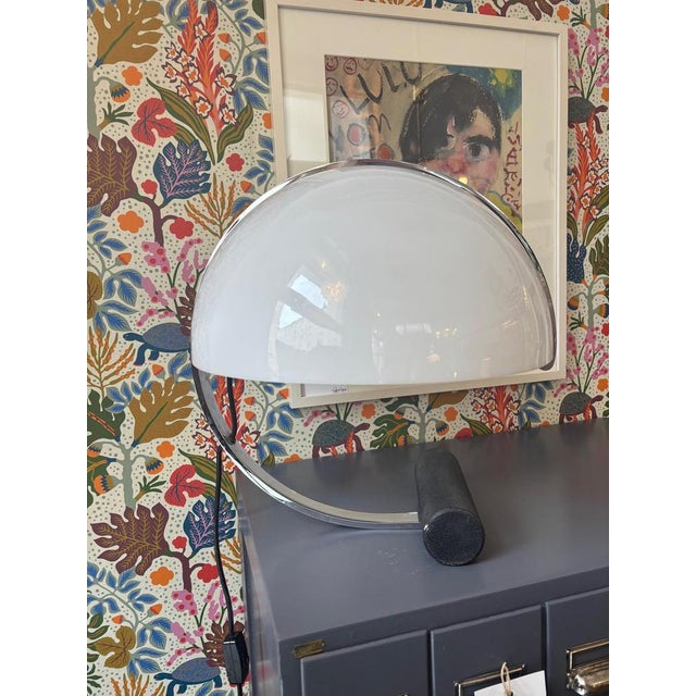 Table lamp by Stilnovo for Artimeta, 1970s Arched chrome-plated steel structure, white acrylic glass H: 40 cm, Diameter:...