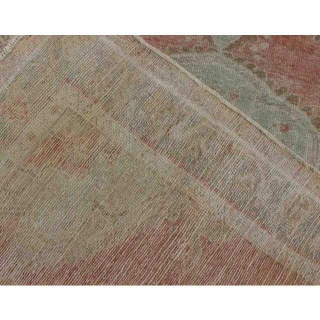 Vintage Turkish Oushak Medallion Rug in Soft Coral, Mint Green, and Beige Tones For Sale - Image 12 of 13