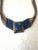 Native American multi-strand liquid silver necklace features an azurite-malachite center pendant