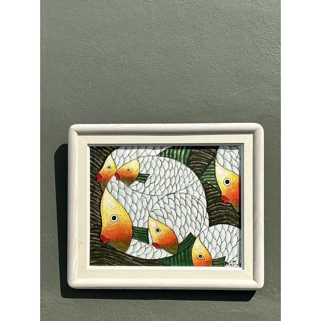 This striking original oil painting, signed by artist M. Martinez, captures a vibrant school of fish in a highly stylized...