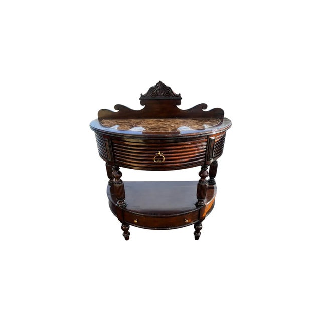 The product is a pair of Marge Carson Demilune Side Tables with marble tops. These antique side tables are fully assembled...
