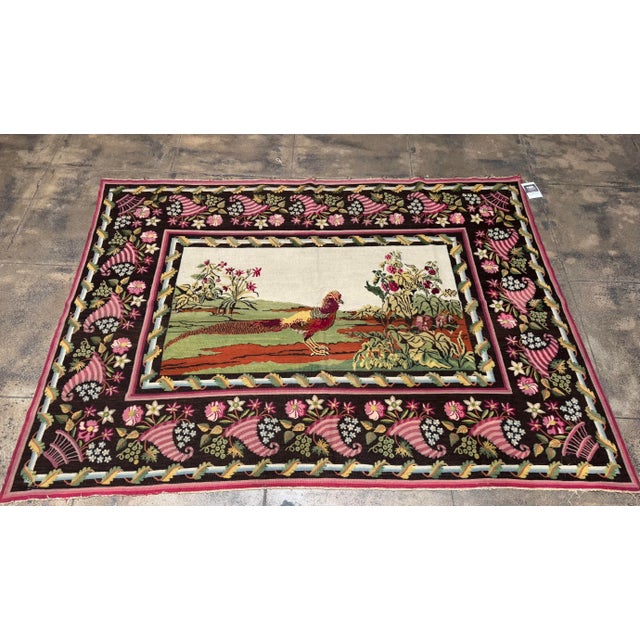 A beautifully expressive antique Bessarabian tapestry dating to the early 20th century, featuring a charming pictorial...