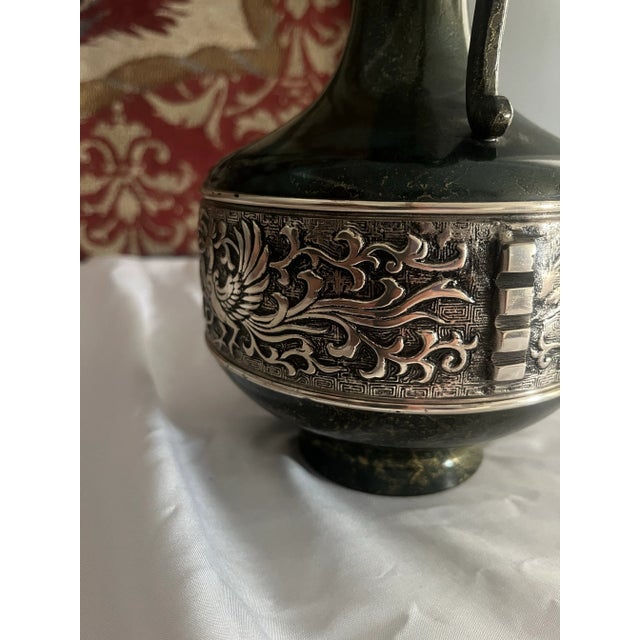 Wonderful Japanese dragon vase will make a vintage accent to any space. This vase has a jade and gold oxidized finish two...
