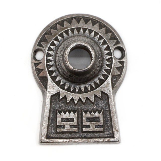 Aesthetic style rosettes made of cast iron. The patinas vary. One is nickel and the other is an antique bronze finish. The...