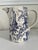 This elegant signed Tiffany & Co. ceramic pitcher features a classic blue and white transferware toile pattern celebrating...