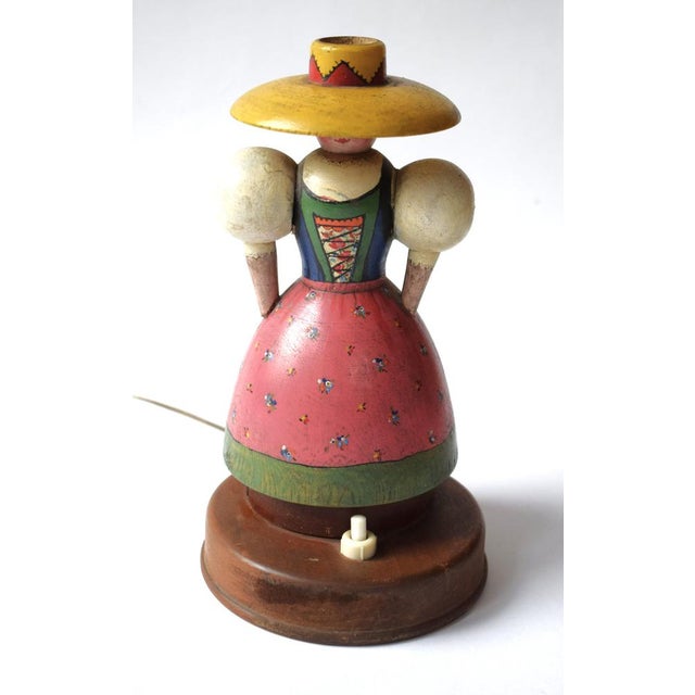 This lamp was handcrafted in the 1930s by a woodcarver from the Ore Mountains who emigrated to South America as a result...