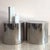 Elevate your interior with this striking pair of Mid-Century Modern polished chrome drum tables, reminiscent of iconic...