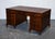 Lovely Rare Globe Wernicke Burgundy Embossed Leather Twin Pedestal Desk. This one-of-a-kind Globe Wernicke Burgundy...