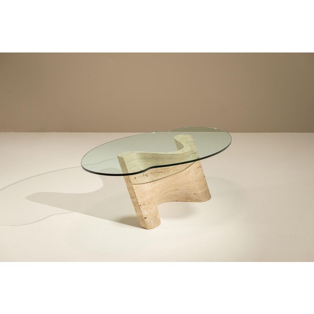 AtKris Studio presents a coffee table that balances architectural clarity with organic movement. Its form feels carved...