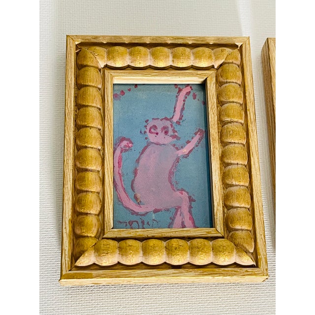 Pair of whimsical miniature pain of Monkey Jocko.