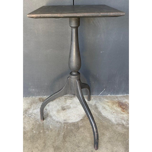 This 20thc Original black painted candle stand is in fine & sturdy condition.It is signed by the maker Adam Mathews and is...