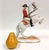 Porcelain figurine of a Lipizzaner horse, rider from the Spanish Riding School, performing the "Courbette" move; Figure is...
