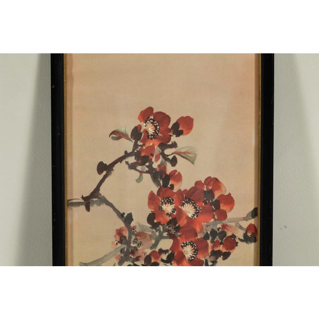 This delicate Japanese painting on paper captures a bright yellow bird perched among flowering branches in full bloom....