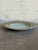 This vintage ceramic shallow basin stands out with its wide circular form and low-profile rim. The minimalist Scandinavian...