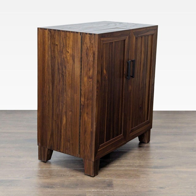 The cabinet is crafted of solid elm with traditional wood-on-wood joinery without the use of nails or screws clean lines....