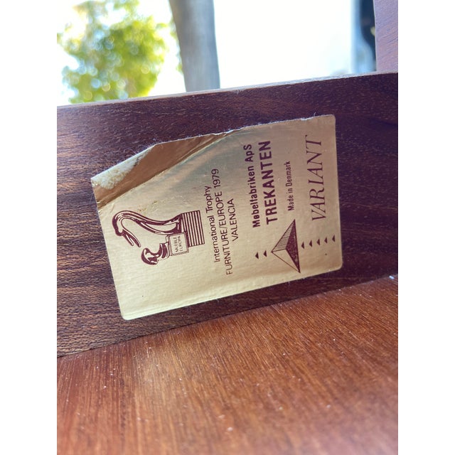 The Vintage MCM Danish Teak Desk from Denmark is a stylish and functional piece of furniture that exudes a retro vibe....