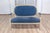 This elegant late 19th-century Louis XVI-style sofa is crafted from beech wood, painted in a soft antique finish that...