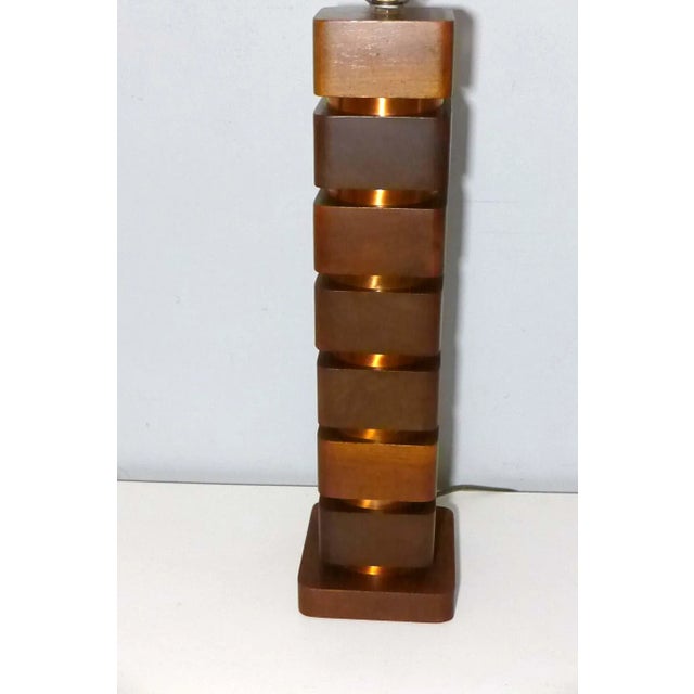 Stacked Maple and Spun Copper Lamp A stunning piece of craftmanship attributed to Russel Wright. Stately lamp is composed...
