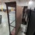 Howard Miller Townsend Lighted Curio Cabinet 680-235, Windsor Cherry With Mirrored Back For Sale - Image 10 of 10