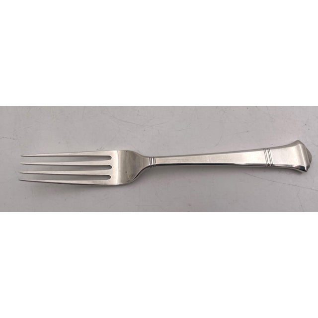 Tiffany & Co. sterling silver flatware set from 1923 in Art Deco style and in Windham pattern, with a beautiful geometric...
