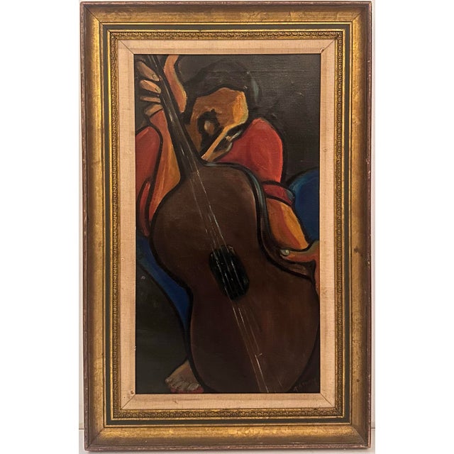 A Cubist-influenced oil painting depicting a figure playing a guitar, rendered in flattened, angular planes of red, blue,...