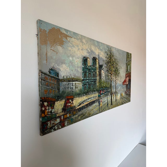 A beautiful vintage oil on canvas depicting a lively Parisian street scene in the distinctive style of Caroline C. Burnett...
