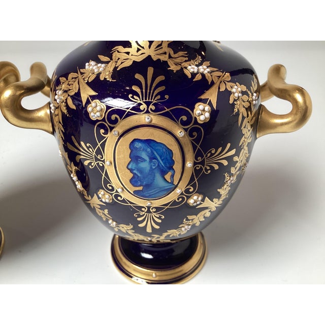 Classic pair of mid 19th Century Cobalt blue and gold portrait cabinet vases. The deep cobalt blue background with azure...
