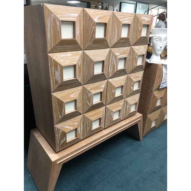 Detail SKU JAD33190 49.5” W, 18” D, 55” H MATERIAL & CONSTRUCTION Solid oak cabinet, wire-brushed and limed with a cerused...