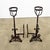 A towering pair of French 18th century forged, wrought iron andiron-chenets to watch over the hearth. They include a small...