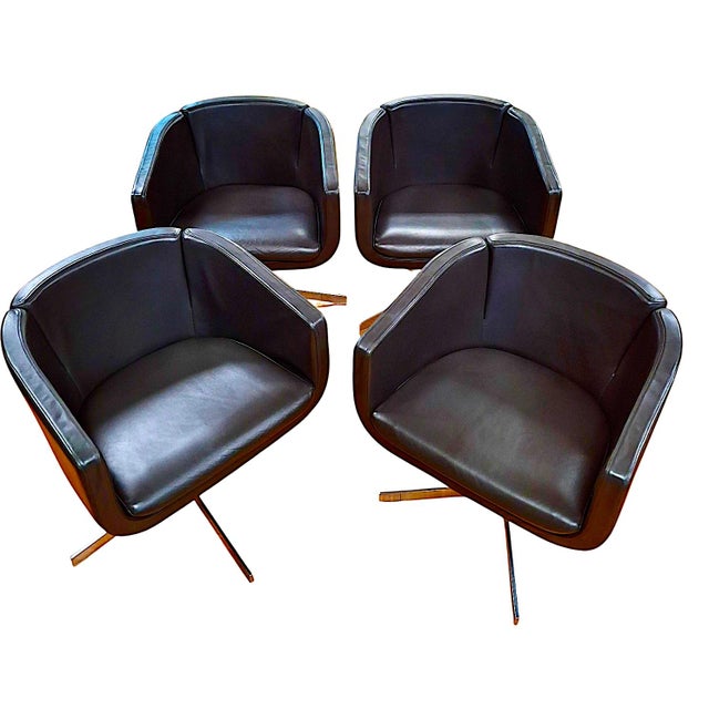 On offer is a set of four Tulip Sixty armchairs. This compact, swiveling luxury armchair was designed by American designer...