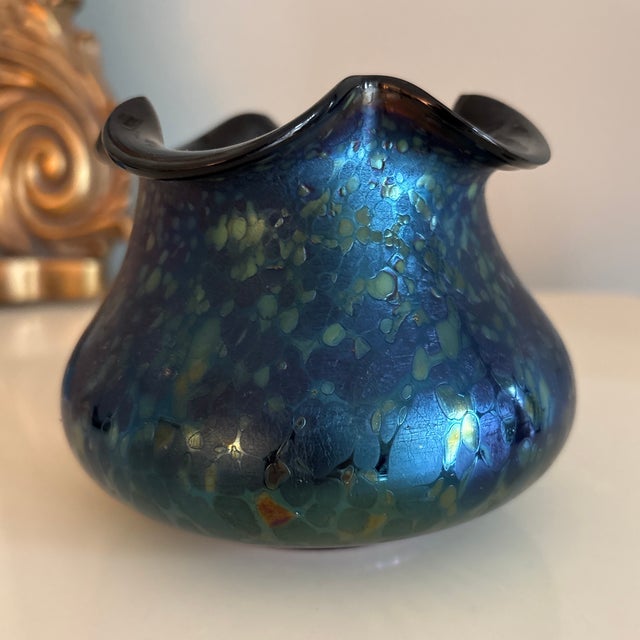 Beautiful example of Johann Loetz bohemian art glass with the distinctive “oil spot” pattern and Quadra-foil rim the...