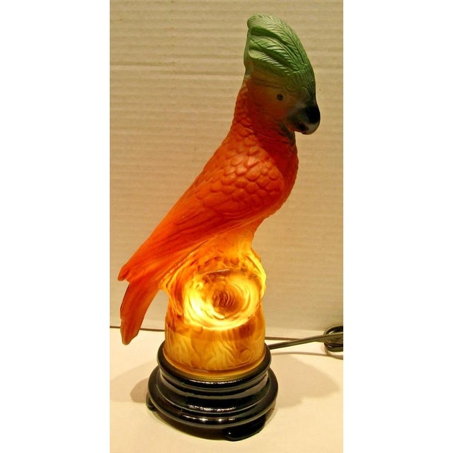 This rare original Tiffin Art Deco glass parrot lamp from the 1930s is a unique and stylish addition to any home decor....