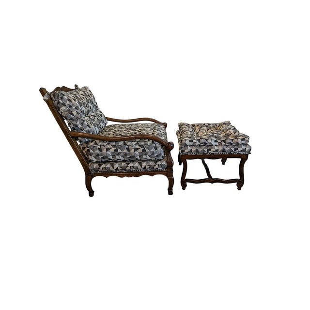 For your consideration is a rare, vintage custom lounge chair and ottoman manufactured by the historic, high-end workshop...