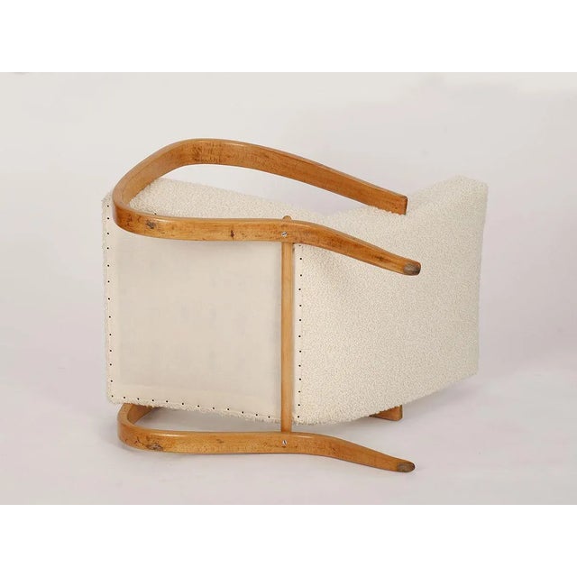 This chair was restored and reupholstered. I have official proof of authenticity such as vintage catalogs, designer...