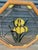 Beautiful vintage stained glass window panel featuring a striking floral design with three large golden-yellow flowers...