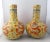 A pair of Chinese porcelain tianqiuping dragon vases, each with an imperial yellow glazed exterior, white glazed interior...