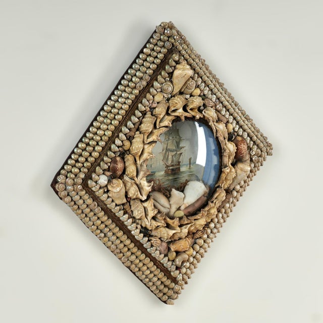 Charming 19th century English sailors valentine handcrafted in exotic seashells, in a diamond or square form, ambitiously...