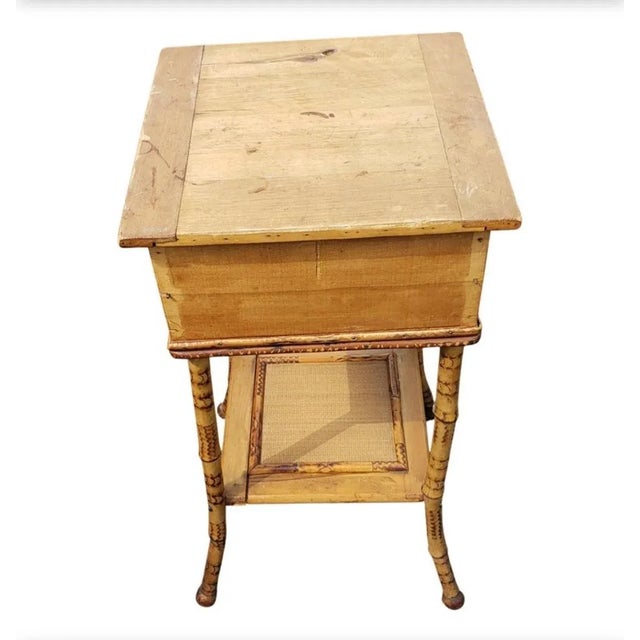 Vintage Ornate Bamboo and woven Raffia Industrial and Work Table with lot of storage. Compartmented storage tray above...