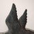 An elegant copper weathervane from the early 1900s, featuring a dramatic three-dimensional composition depicting a swan in...