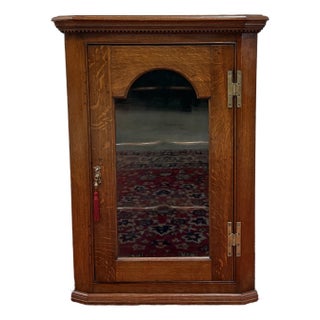 Antique English Corner Cabinet Carved Oak Hanging Wall Cabinet Storage c.1920s For Sale