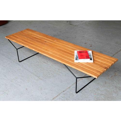 This modernist, solid beech slatted bench is a true design classic designed by Harry Bertoia for Knoll International USA...