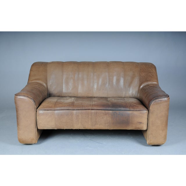 Original de Sede DS44 Two-Seater Buffalo Leather Sofa We are offering a high-quality DS44 two-seater sofa by de Sede with...