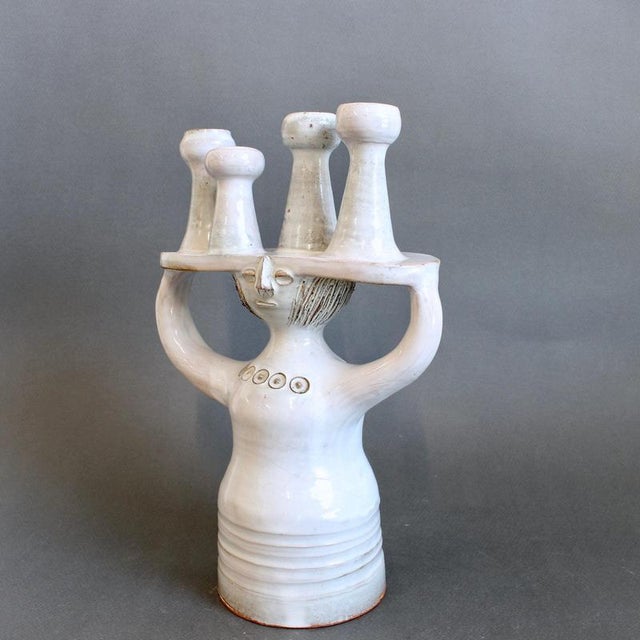 Glazed 'pottery porter' ceramic sculpture (circa 1960s-70s) by jacques pouchain. This is a delightful, whimsical candle...